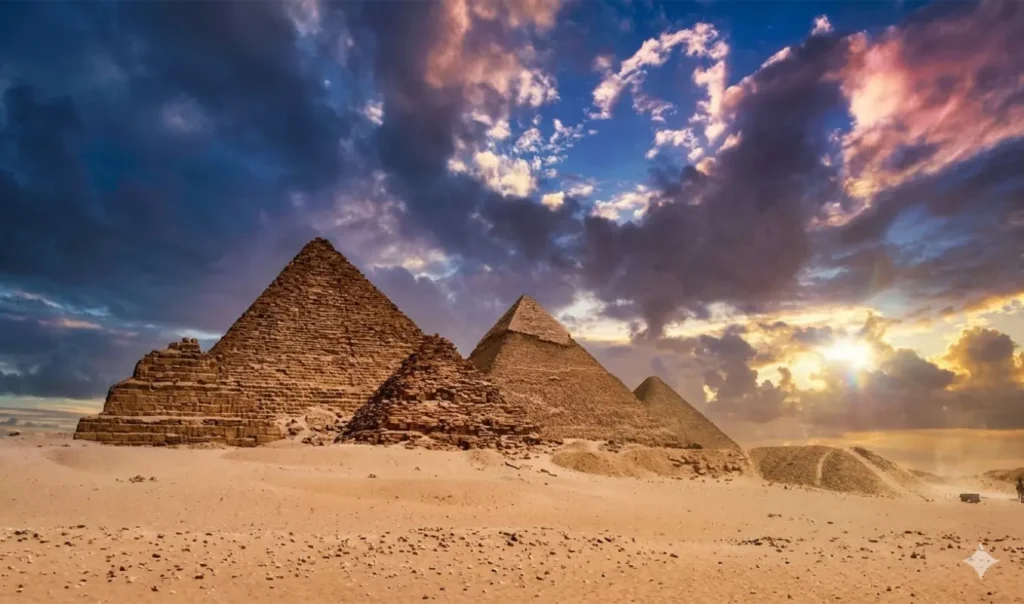 giza pyramids "الأهرامات الثلاثة في الجيزة – أكبر معالم مصر السياحية وأكثرها شهرة عالميًا – تجسد عبقرية المصريين القدماء وروعة الحضارة الفرعونية. تقع بالقرب من القاهرة وتُعد من عجائب الدنيا السبع القديمة، حيث تجذب ملايين السياح سنويًا لاكتشاف أسرارها التاريخية والمعمارية."